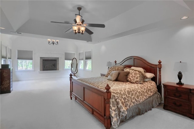 bedroom featuring multiple windows, light carpet, recessed lighting, and visible vents
