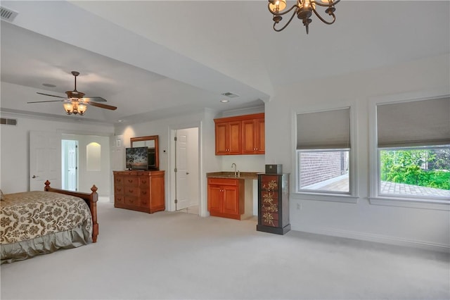 bedroom with baseboards, a sink, a notable chandelier, and light carpet