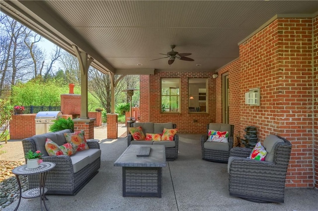 view of patio / terrace featuring a ceiling fan, outdoor lounge area, and a grill