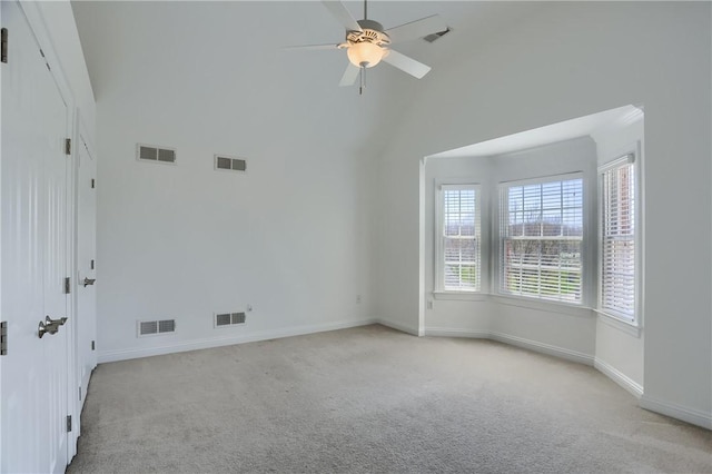 unfurnished room featuring light carpet and visible vents