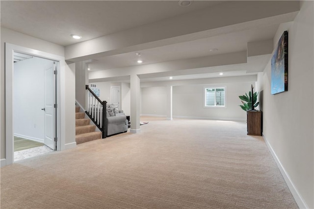 basement with baseboards, carpet flooring, recessed lighting, and stairway