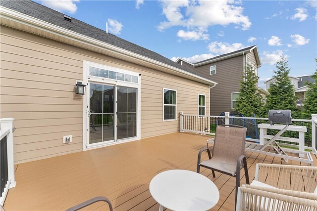 wooden terrace with grilling area