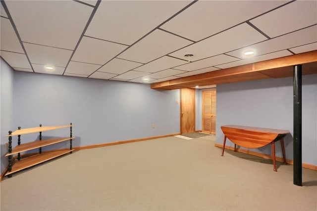 finished basement featuring baseboards, carpet flooring, and recessed lighting