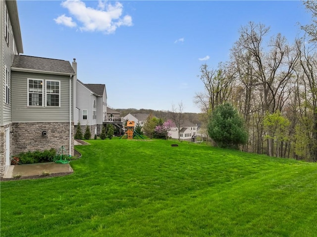 view of yard with a playground