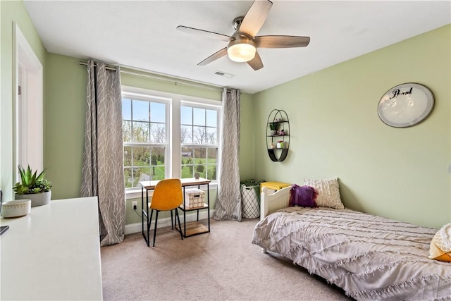 bedroom with visible vents, carpet, and ceiling fan