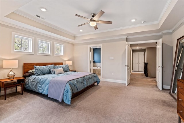 bedroom with crown molding, a raised ceiling, light carpet, and visible vents