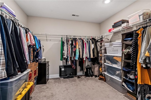 walk in closet with carpet flooring and visible vents