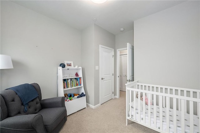 bedroom featuring carpet floors and baseboards