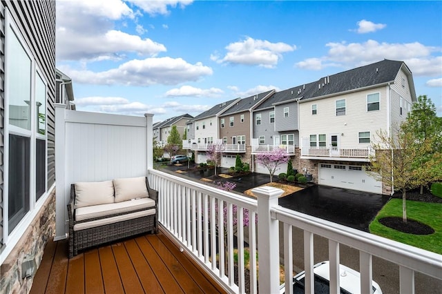 balcony featuring a residential view