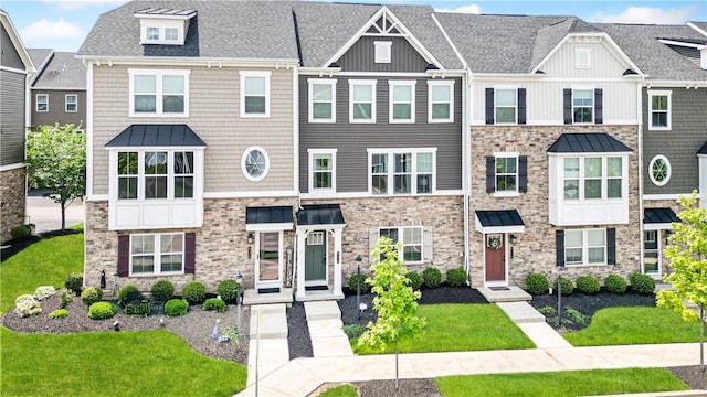 816 Theda Dori St, Cranberry Twp, PA 16066 - view of property with stone siding, board and batten siding, roof with shingles, and a front yard