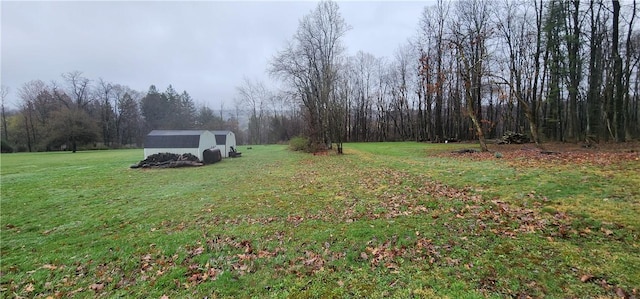 54 Old Dinnerbell Rd, Farmington, PA 15437 - view of yard with an outdoor structure