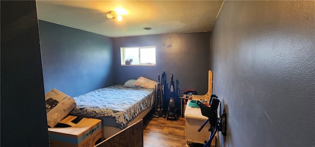 54 Old Dinnerbell Rd, Farmington, PA 15437 - bedroom with wood finished floors