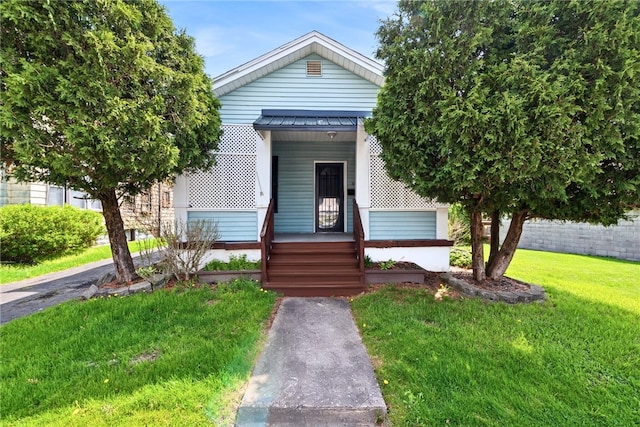 410 Butz St, New Castle/3Rd, PA 16101 - view of front of house with a front lawn and metal roof