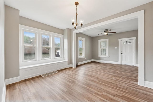 410 Butz St, New Castle/3Rd, PA 16101 - interior space with baseboards, visible vents, ceiling fan with notable chandelier, and light wood-style floors