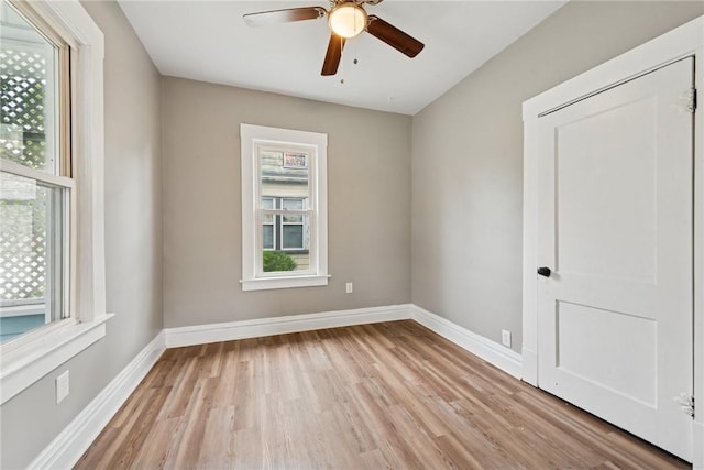 410 Butz St, New Castle/3Rd, PA 16101 - unfurnished room with light wood-style floors, a ceiling fan, and baseboards
