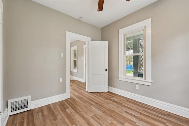 410 Butz St, New Castle/3Rd, PA 16101 - unfurnished room with baseboards, ceiling fan, wood finished floors, and visible vents