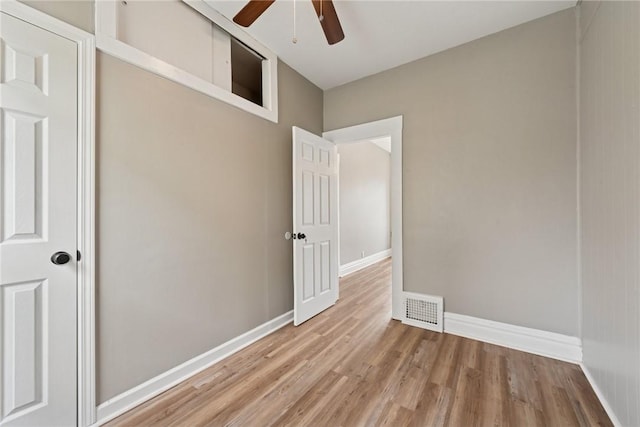 410 Butz St, New Castle/3Rd, PA 16101 - unfurnished bedroom with visible vents, light wood finished floors, ceiling fan, and baseboards