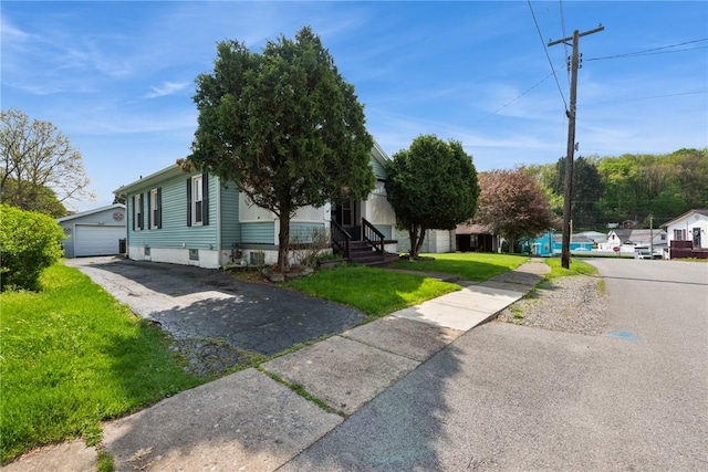 410 Butz St, New Castle/3Rd, PA 16101 - view of front of house with a garage, an outbuilding, entry steps, and a front lawn