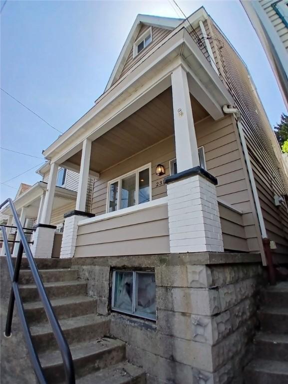2318 Salisbury St, South Side, PA 15210 - view of side of home featuring stairway