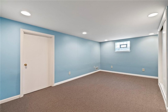 below grade area featuring recessed lighting, carpet flooring, and baseboards