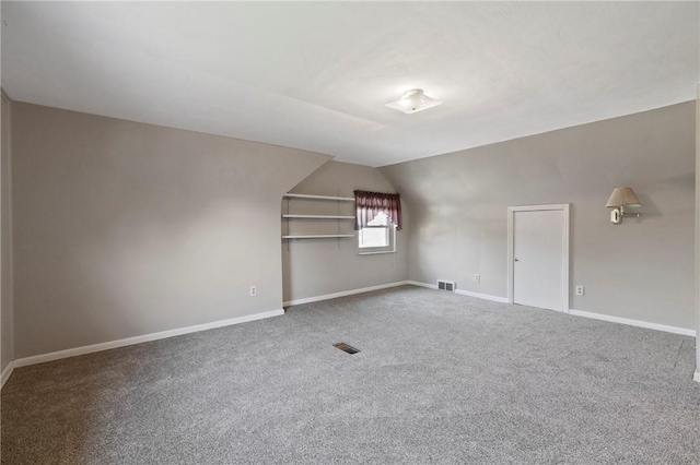 bonus room featuring carpet flooring, baseboards, and visible vents