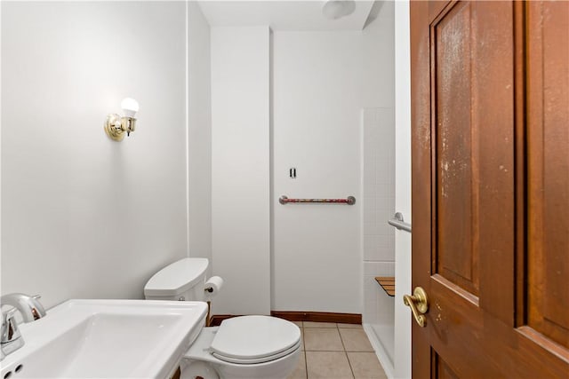 503 Beechwood Ave, Carnegie, PA 15106 - bathroom with walk in shower, a sink, toilet, tile patterned floors, and baseboards