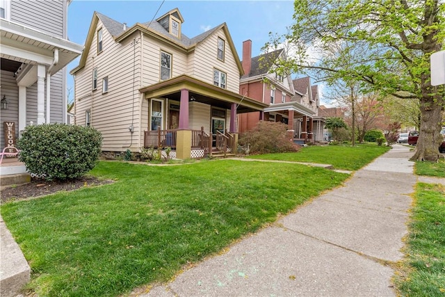 503 Beechwood Ave, Carnegie, PA 15106 - view of front of home featuring covered porch and a front yard