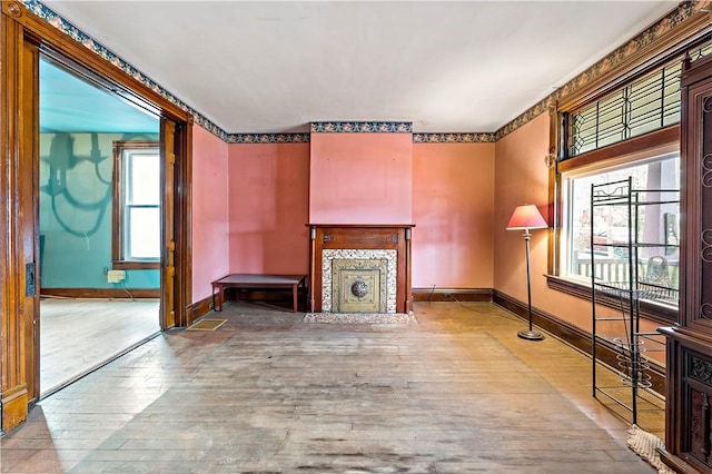 503 Beechwood Ave, Carnegie, PA 15106 - unfurnished living room featuring baseboards and hardwood / wood-style floors