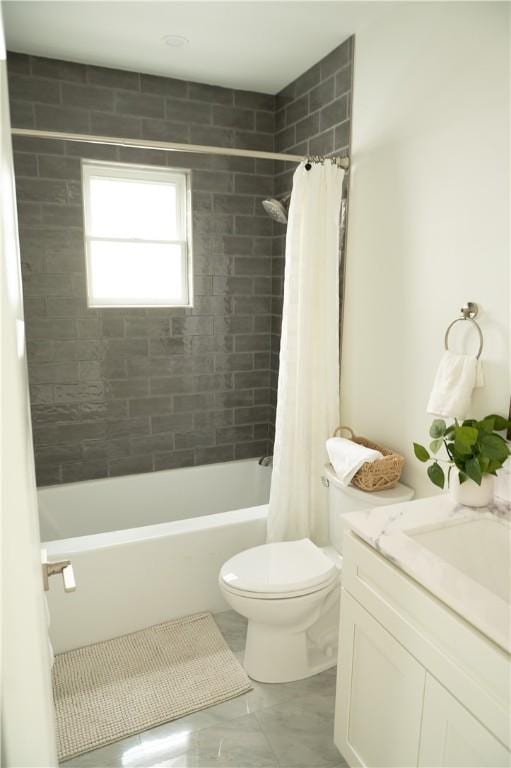 full bathroom with toilet, shower / bath combination with curtain, marble finish floor, and vanity