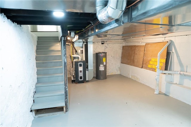 unfinished basement featuring heating unit, stairs, and electric water heater