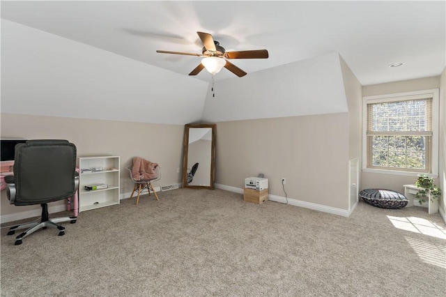 carpeted office space with baseboards, a ceiling fan, and lofted ceiling