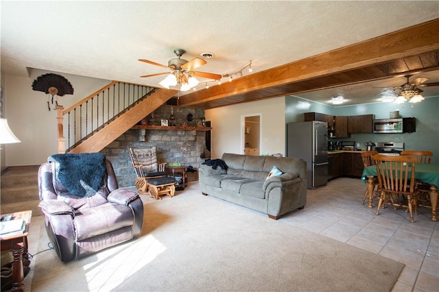 357 Pohls Rd, Raccoon Twp, PA 15001 - living area featuring a ceiling fan, light tile patterned floors, and stairway