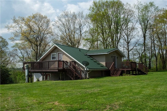 357 Pohls Rd, Raccoon Twp, PA 15001 - rear view of house with a lawn, stairs, metal roof, and a deck