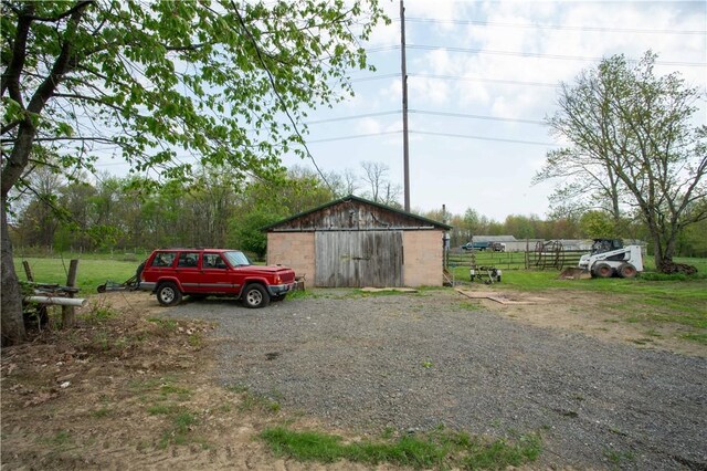 357 Pohls Rd, Raccoon Twp, PA 15001 - view of vehicle parking with a barn and fence