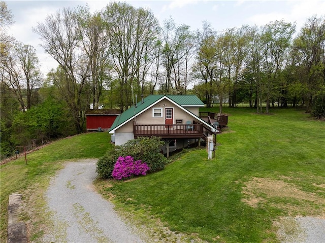 357 Pohls Rd, Raccoon Twp, PA 15001 - view of front facade featuring a wooden deck, a front yard, and gravel driveway