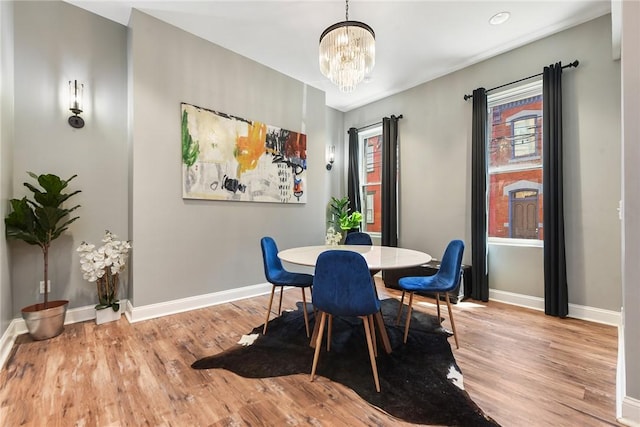 308 Jacksonia St, Central North Side, PA 15212 - dining room featuring an inviting chandelier, baseboards, and light wood-style floors
