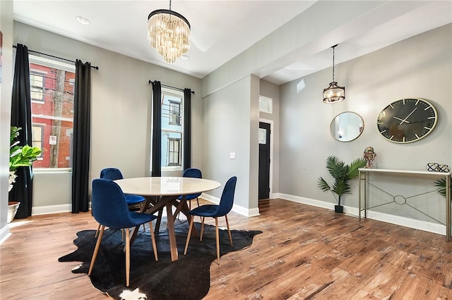308 Jacksonia St, Central North Side, PA 15212 - dining area with baseboards, plenty of natural light, wood finished floors, and a chandelier