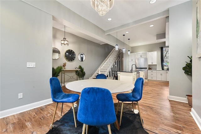 308 Jacksonia St, Central North Side, PA 15212 - dining space featuring wood finished floors, stairway, baseboards, an inviting chandelier, and recessed lighting