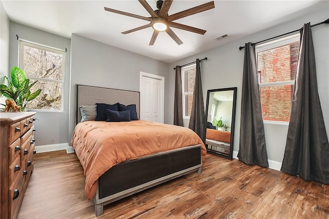 308 Jacksonia St, Central North Side, PA 15212 - bedroom with baseboards, wood finished floors, and visible vents