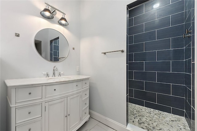 308 Jacksonia St, Central North Side, PA 15212 - bathroom with a walk in shower, marble finish floor, baseboards, and vanity