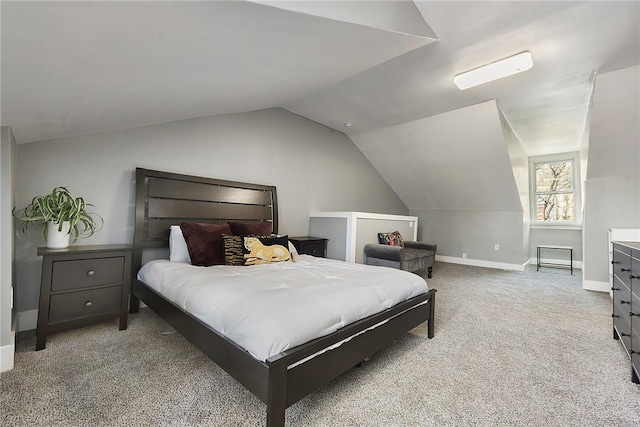 308 Jacksonia St, Central North Side, PA 15212 - carpeted bedroom with baseboards and vaulted ceiling