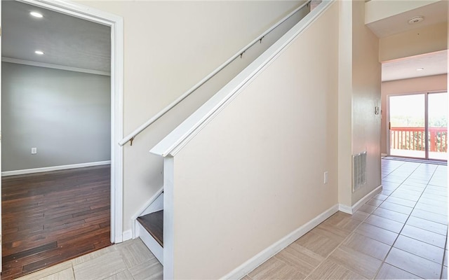 staircase featuring baseboards, recessed lighting, tile patterned flooring, and visible vents
