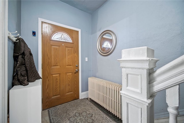 206 7th St, Oakmont, PA 15139 - foyer with radiator heating unit and baseboards