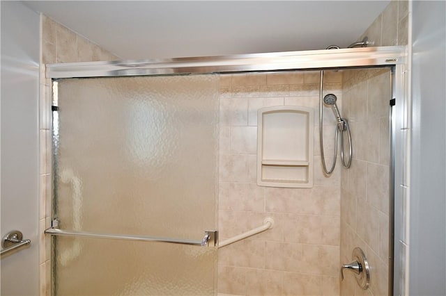 bathroom with an enclosed shower