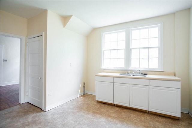 1315 Main St, Aliquippa, PA 15001 - bar with baseboards and a sink