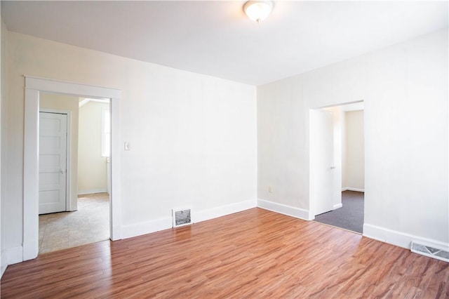1315 Main St, Aliquippa, PA 15001 - unfurnished room with visible vents, baseboards, and wood finished floors