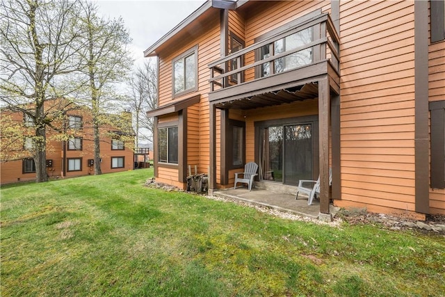 2805 Swiss Mountain Dr, Seven Springs Resort, PA 15622 - rear view of property with a lawn, a patio area, and a balcony