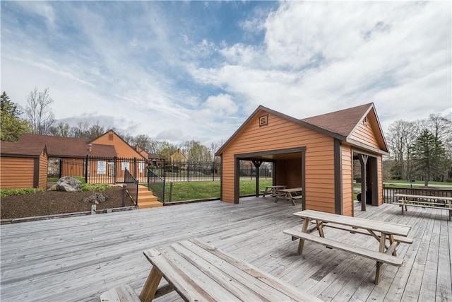 2805 Swiss Mountain Dr, Seven Springs Resort, PA 15622 - deck with fence, outdoor dining area, and an outdoor structure