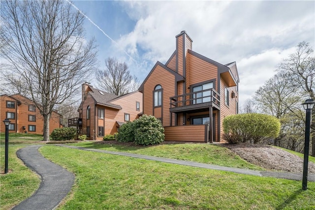 2805 Swiss Mountain Dr, Seven Springs Resort, PA 15622 - back of property featuring a lawn, a chimney, and a balcony