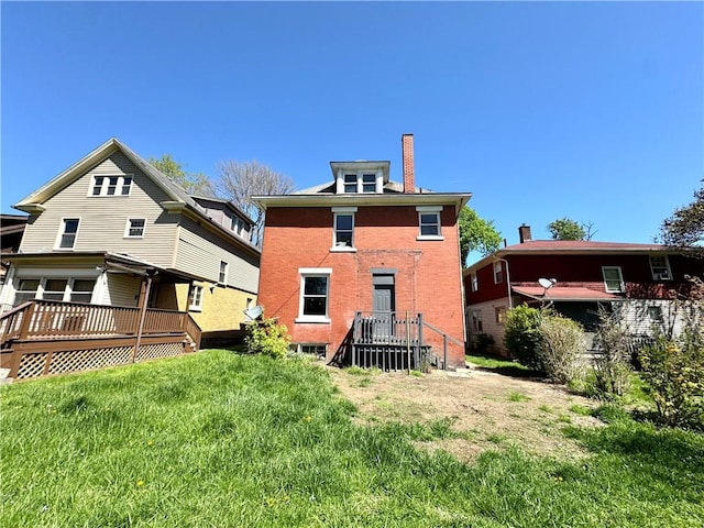 432 Boyles Ave, New Castle/2Nd, PA 16101 - back of house featuring a lawn, a chimney, and brick siding
